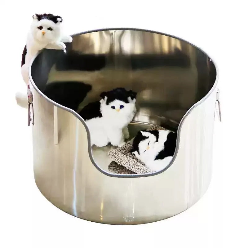 Round silver stainless steel cat litter box with a low front entry cut-out, featuring toy cats.