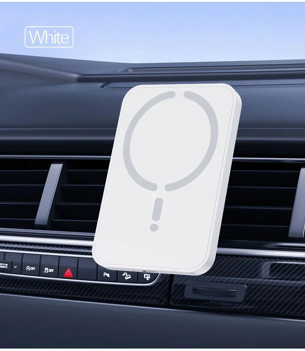 White, rectangular magnetic car phone mount attached to a vehicle air vent, featuring a minimalist design.