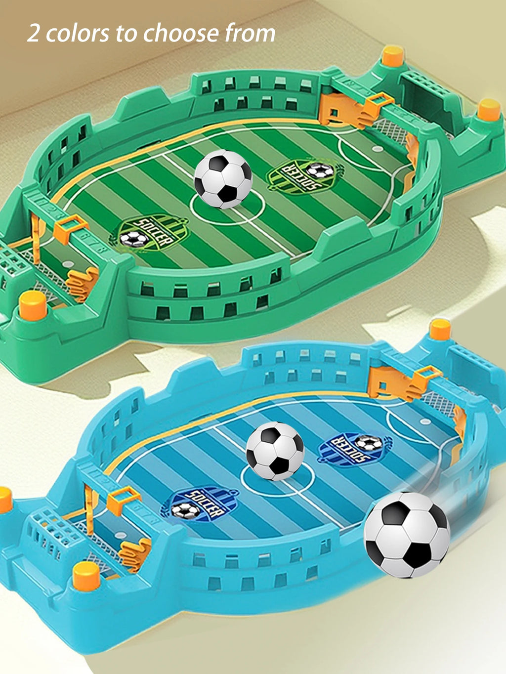 Two miniature green and blue plastic football table games featuring stadium-style walls and small soccer balls.