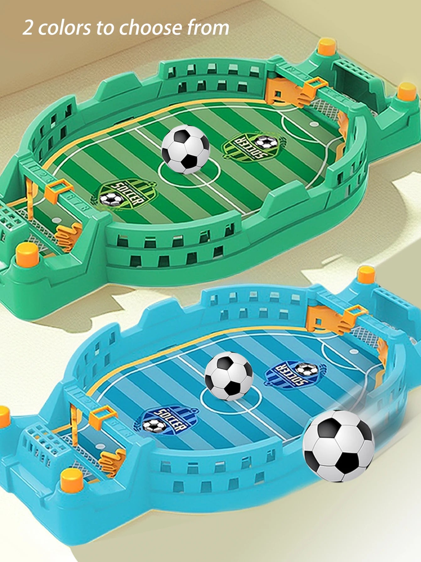 Two miniature green and blue plastic football table games featuring stadium-style walls and small soccer balls.