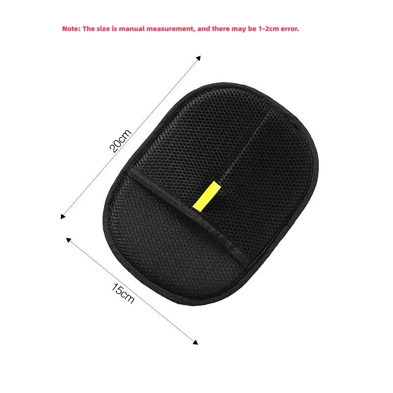 Oval black mesh storage pocket with a small yellow detail, measuring 20cm by 15cm.