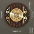 Decorative circular wall clock featuring a wood-effect geometric frame, gold clock face and mother-of-pearl detail.