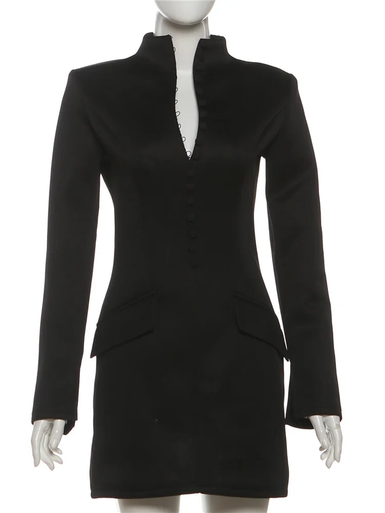 Black bodycon office dress featuring a stand collar, single-breasted button placket, and flap pockets.