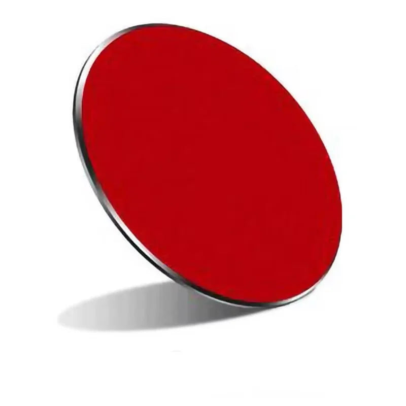 A sleek, circular, solid red wireless charging pad with a thin metallic silver rim, angled against a white background.