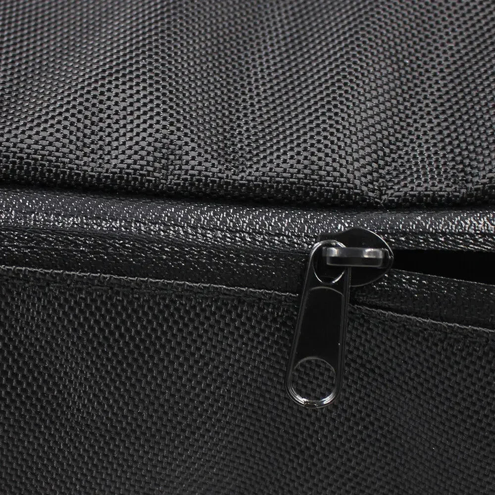 Black waterproof electric scooter battery bag fabric close-up with zipper.