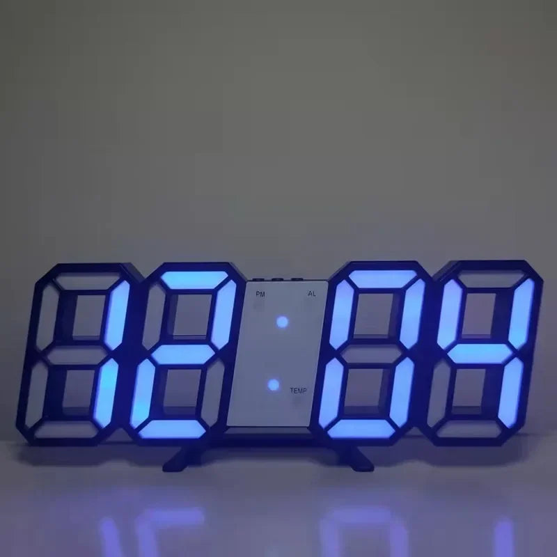 Modern digital alarm clock with a sleek black frame and bright blue LED display showing large, clear numbers.