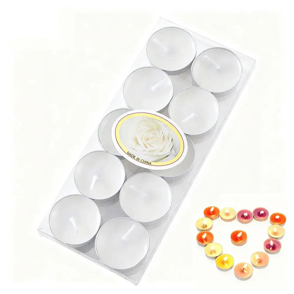 Pack of 10 white tea light candles in a clear tray, with a separate heart-shaped arrangement of lit coloured candles.