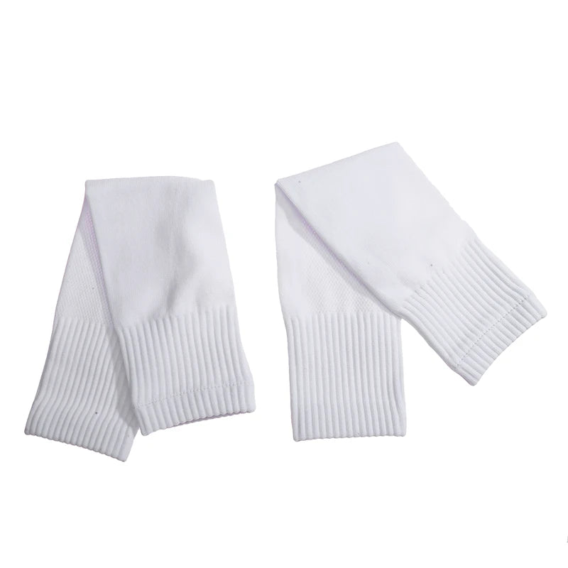 Pair of plain white, fold-over ankle socks with a ribbed cuff design, presented against a plain white background.