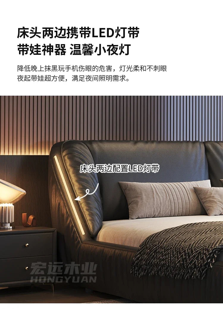 Modern black upholstered king-size bed frame featuring integrated LED light strips along the curved headboard.