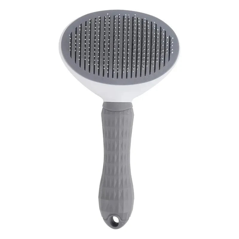 Grey and white oval pet slicker brush with a textured, non-slip handle and a hanging hole at the base.