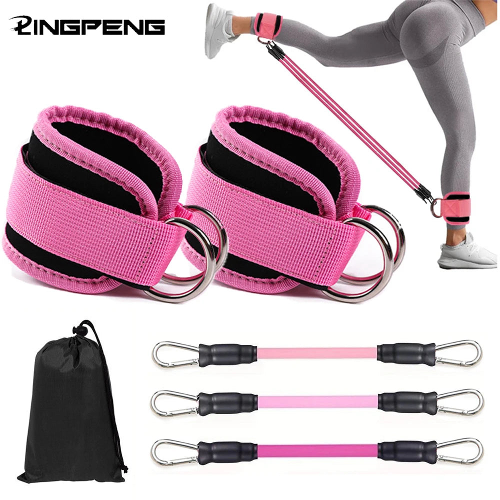 Pink ankle straps with metal D-rings, three resistance bands with carabiners, and a black drawstring storage bag.