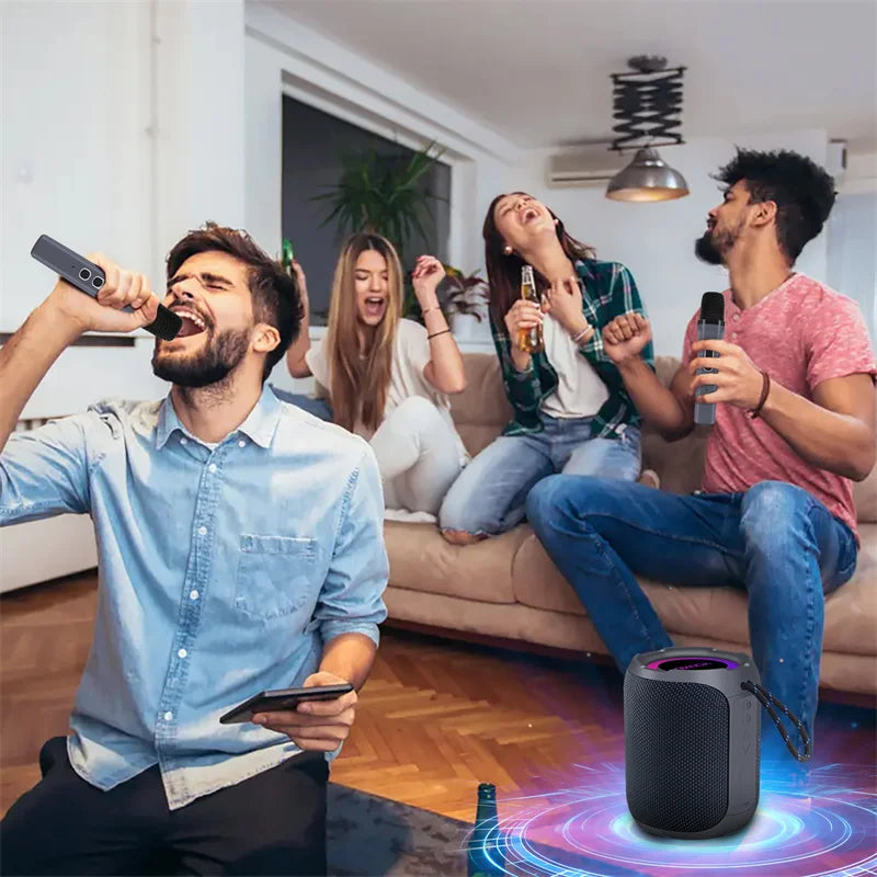 Friends singing karaoke using microphones with a portable black waterproof Bluetooth speaker in a modern living room.