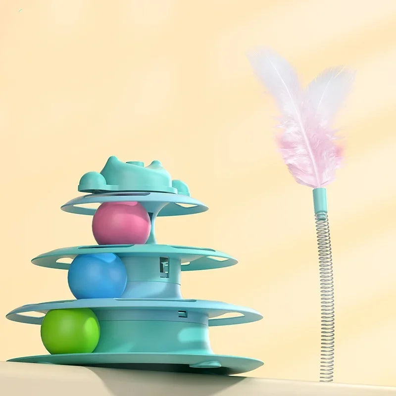 Teal three-tier interactive cat toy turntable with pink, blue, and green balls plus a springy feather teaser wand.