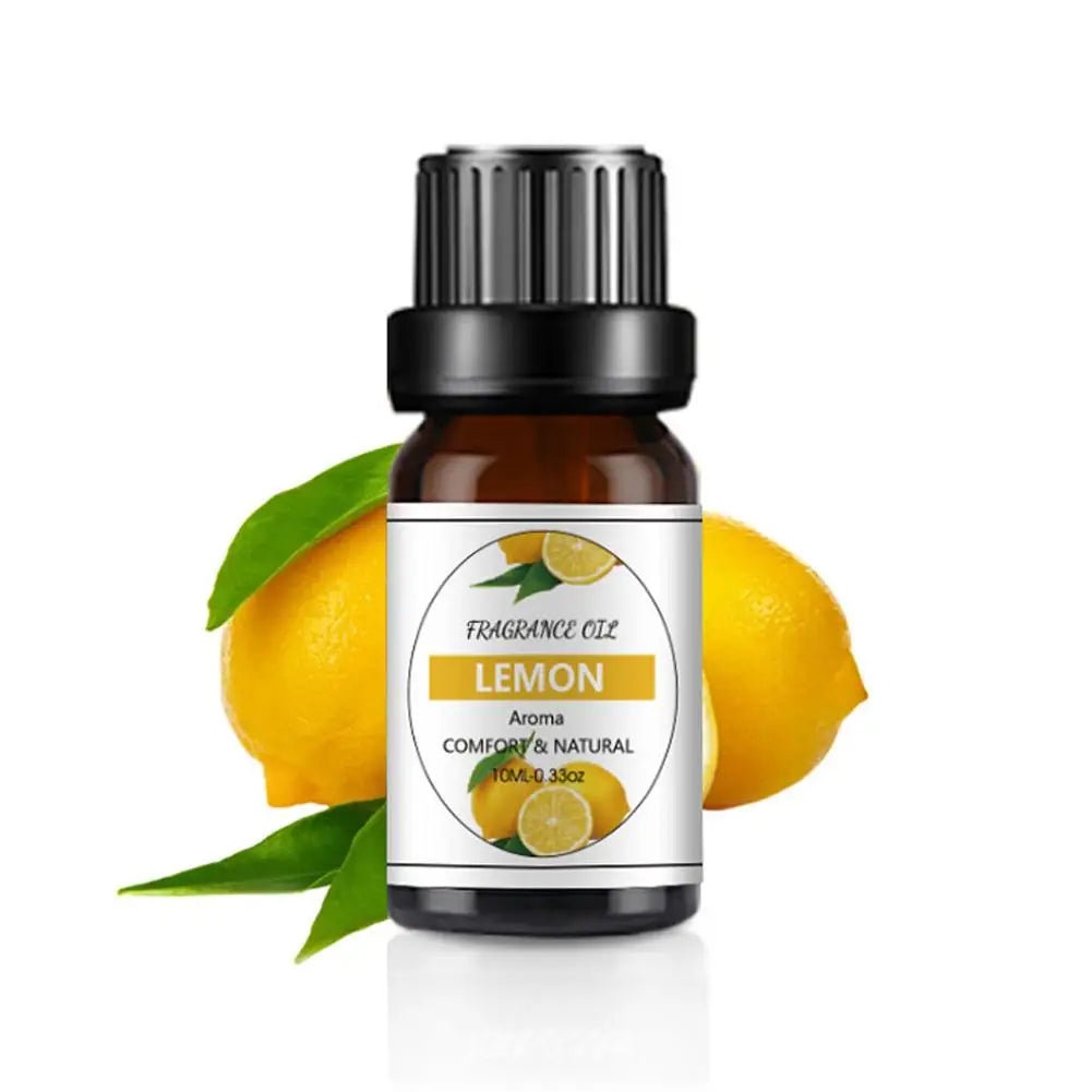 10ml amber glass bottle of lemon fragrance oil with a black dropper cap, set against fresh yellow lemons and leaves.