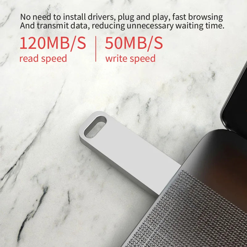 Sleek silver metal USB flash drive plugged into a laptop, highlighting fast read and write speeds.