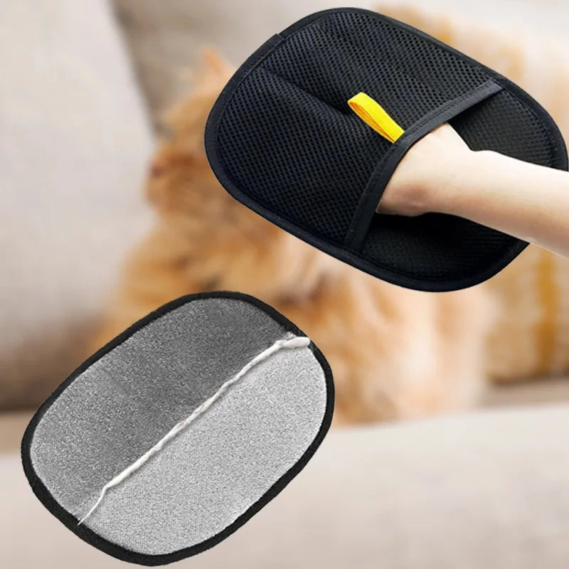 Black and grey double-sided grooming mitt for pets with a yellow strap and mesh backing.