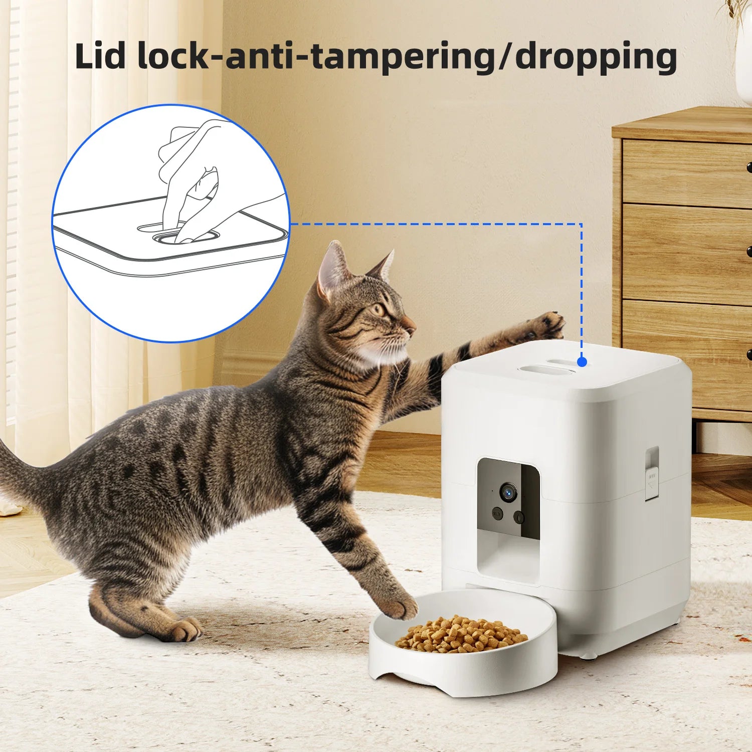 White smart pet feeder with a camera, food bowl, and secure locking lid, being swiped at by a tabby cat.
