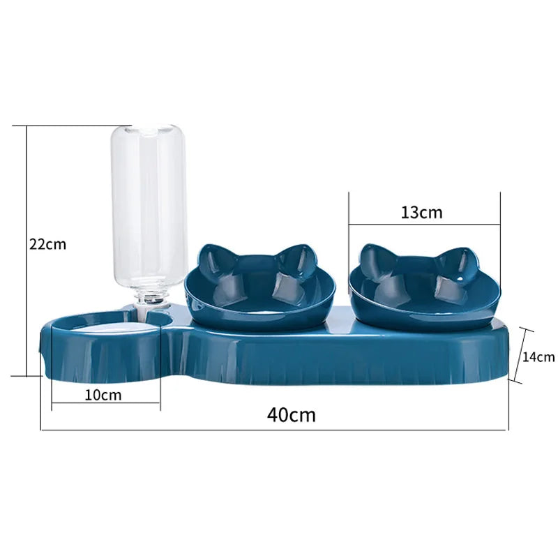 Dark blue pet feeder with two cat-ear shaped bowls and an attached clear water bottle, labeled with dimensions.