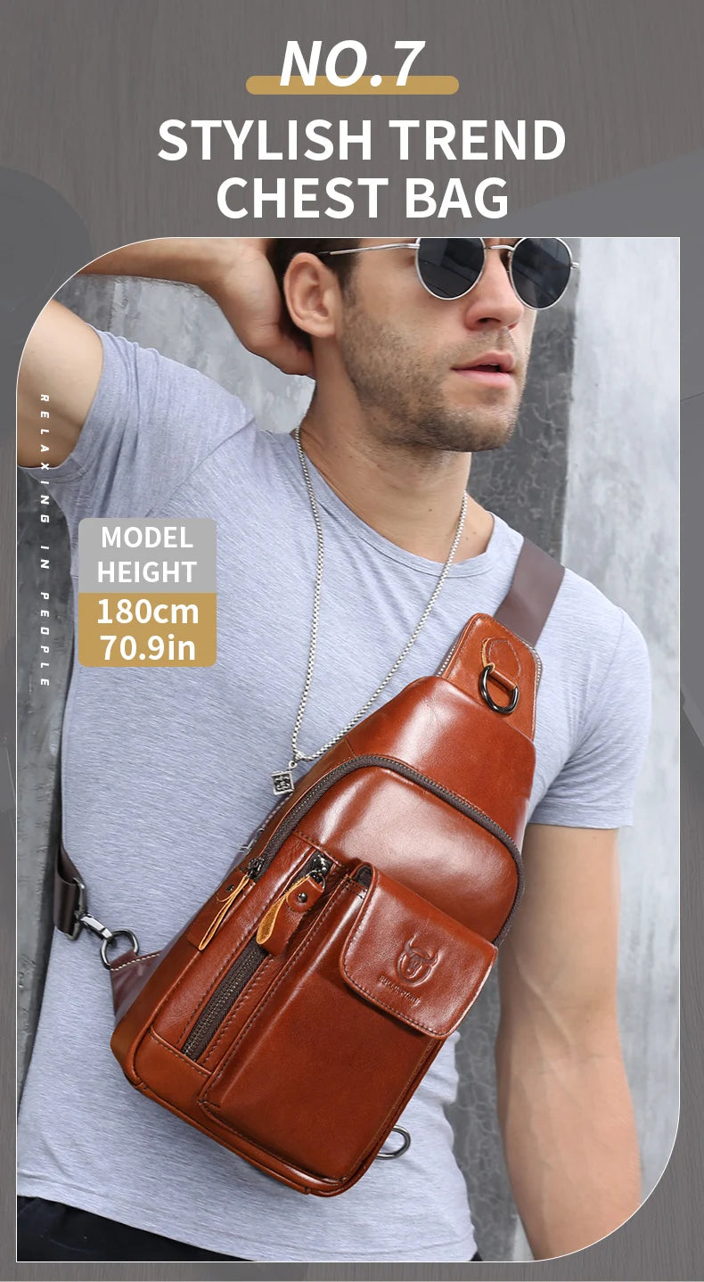 A man wearing a tan leather-look crossbody chest bag with multiple zipped compartments and a wide shoulder strap.