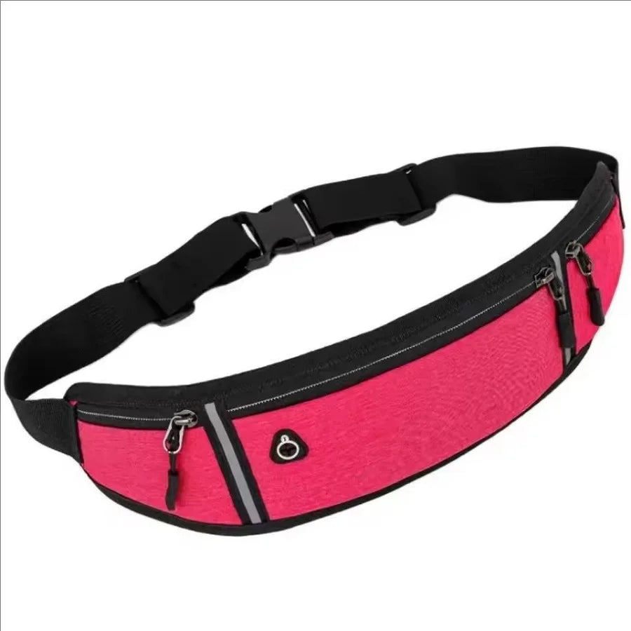 Hot pink running waist belt with black adjustable strap, secure buckle, and multiple zipped pockets for storage.