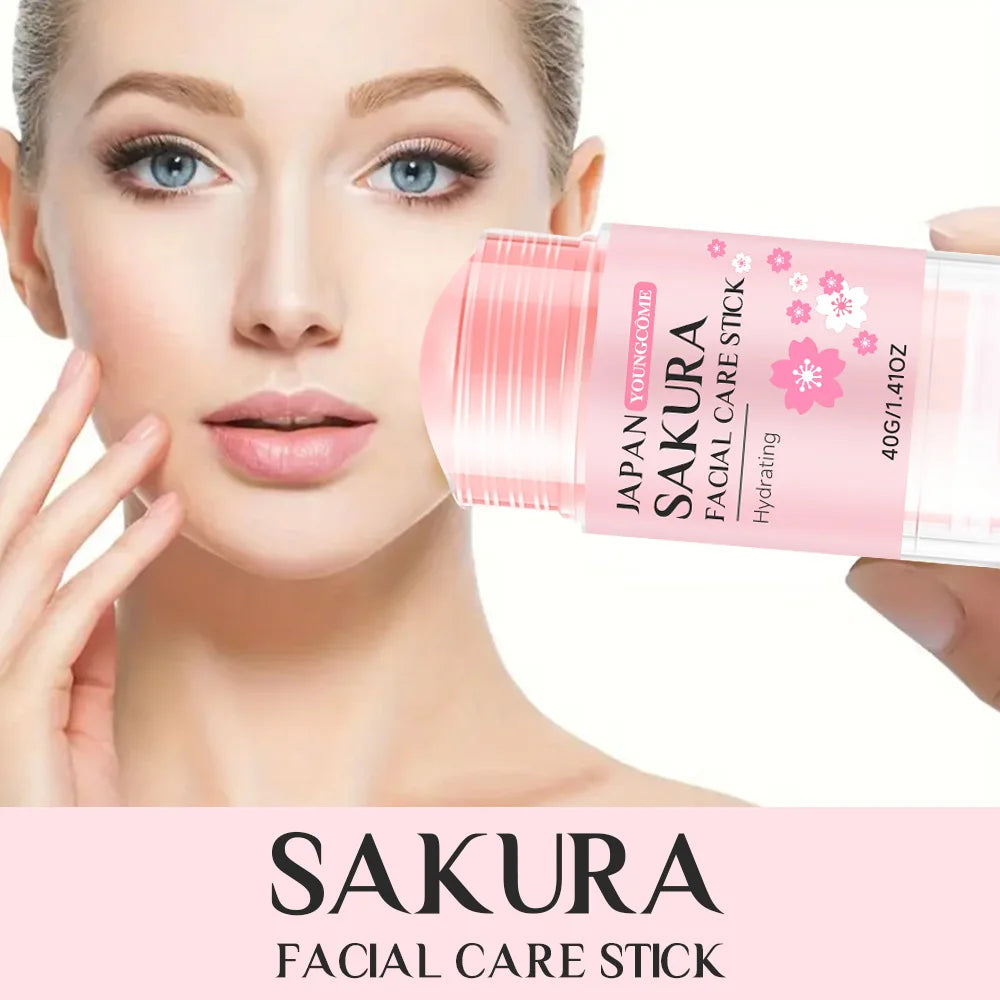 Woman applying a light pink Sakura hydrating facial care stick to her cheek.