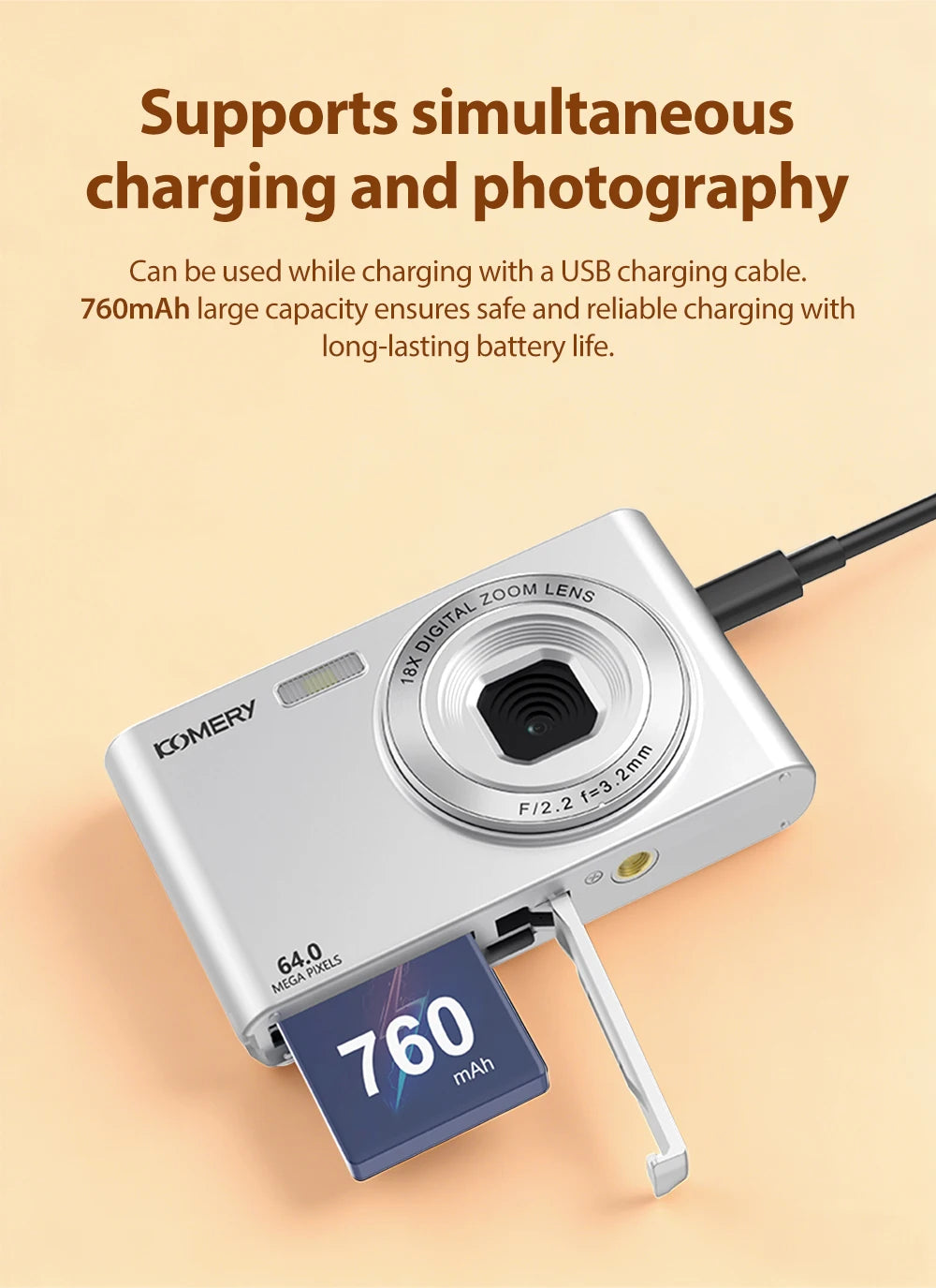 Silver digital camera with 64MP lens and a 760mAh battery being charged via a USB cable.