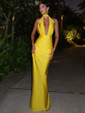Yellow halter maxi dress with a deep V-neck, sleeveless bodycon fit, and ruched bodice detail.