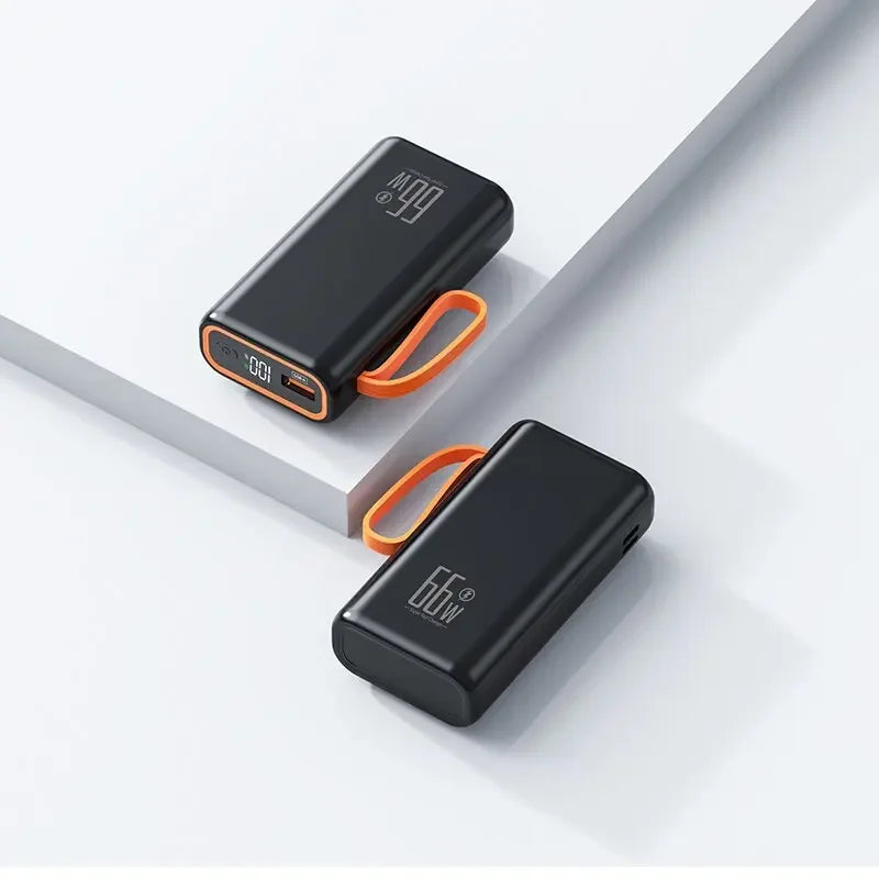 Two black 20,000mAh portable power banks with orange carry straps and digital displays showing 66W fast charging.