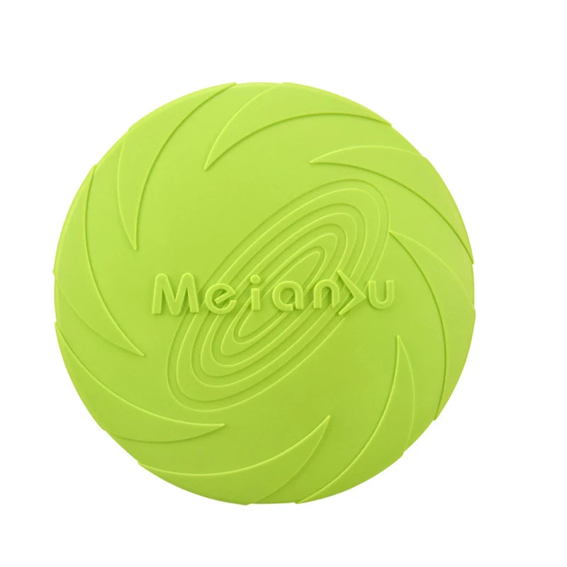 Bright green, durable silicone flying disc dog toy featuring a circular, aerodynamic swirl pattern design.