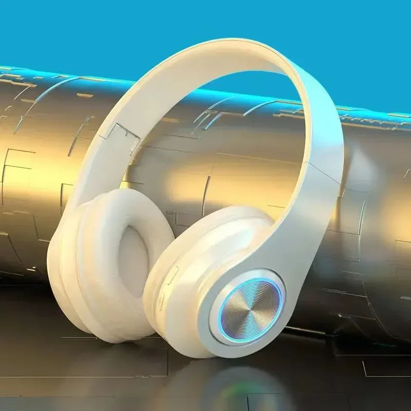 Sleek white wireless gaming headset with cushioned ear pads and a circular metallic accent with glowing blue light.