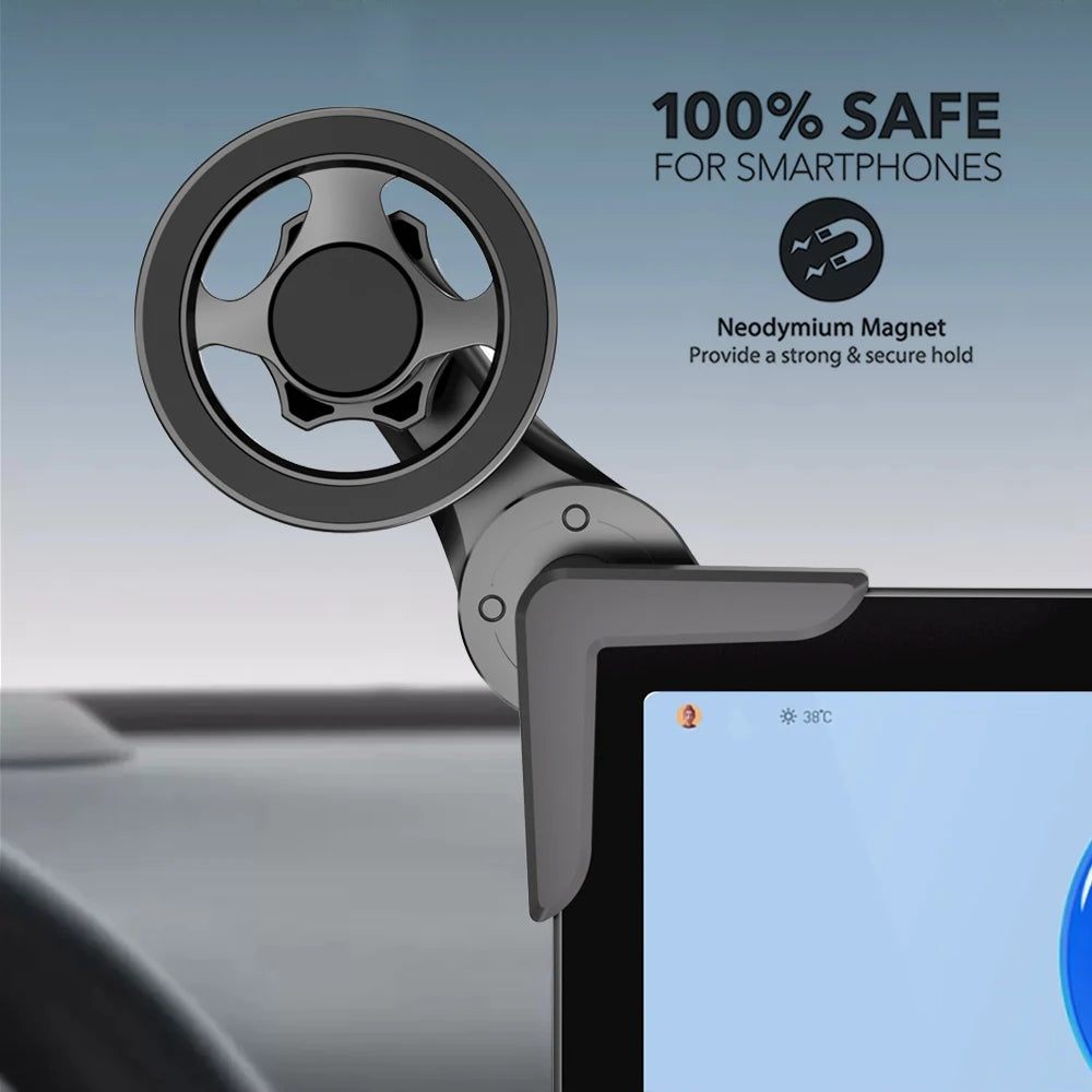 Grey magnetic car mount holder attached to a vehicle screen, featuring a minimalist, circular design.