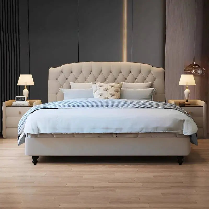 Cream-coloured upholstered queen bed frame with an elegant button-tufted curved headboard.