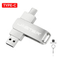 Silver dual-ended flash drive with USB-C and USB 2.0 connectors, featuring a swivel metal design and included keyring.
