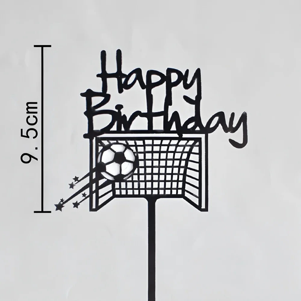 Black "Happy Birthday" cake topper featuring a football goal, a soccer ball, and decorative star trails. 9.5cm tall.