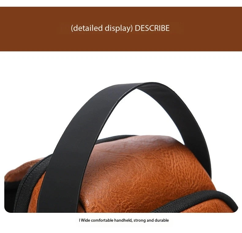 Close-up of a tan, textured faux leather crossbody bag featuring a sturdy, wide black carrying handle.