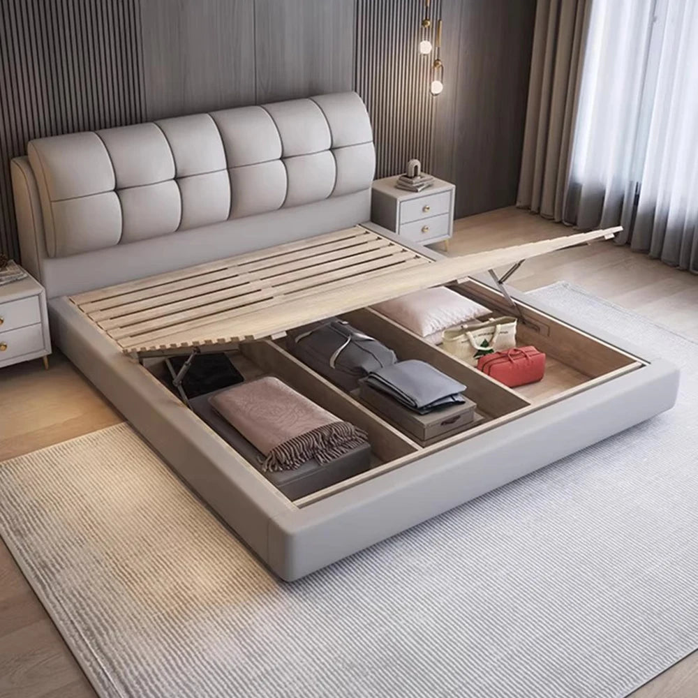 Minimalist grey queen bed frame with a button-tufted headboard and lift-up base revealing convenient hidden storage.