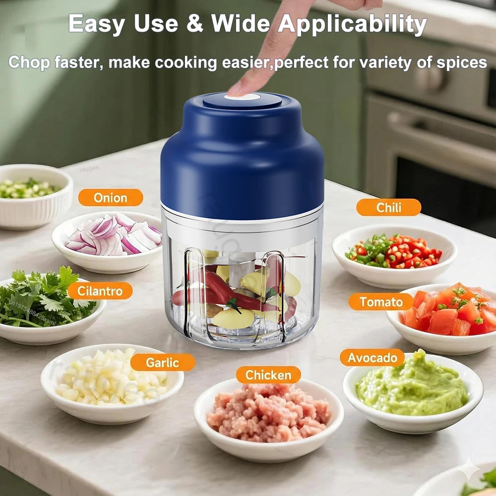 A compact electric food chopper with a blue top and transparent bowl, surrounded by bowls of chopped ingredients.