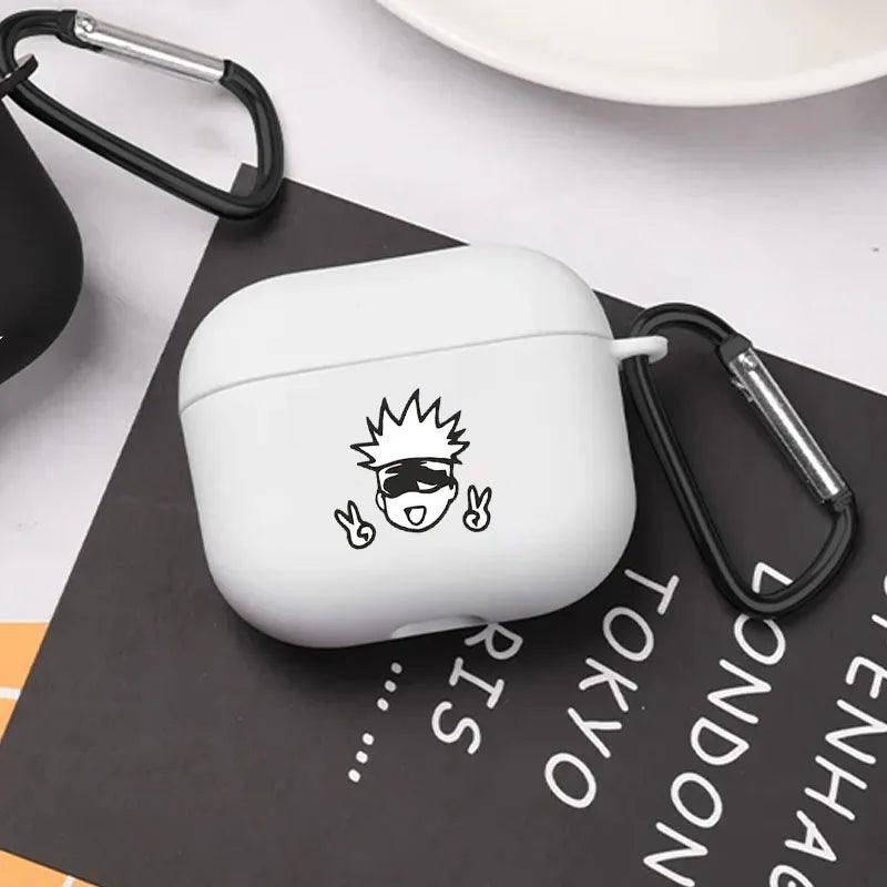 White silicone AirPods Pro case featuring a black Gojo character print, complete with a black metal carabiner clip.