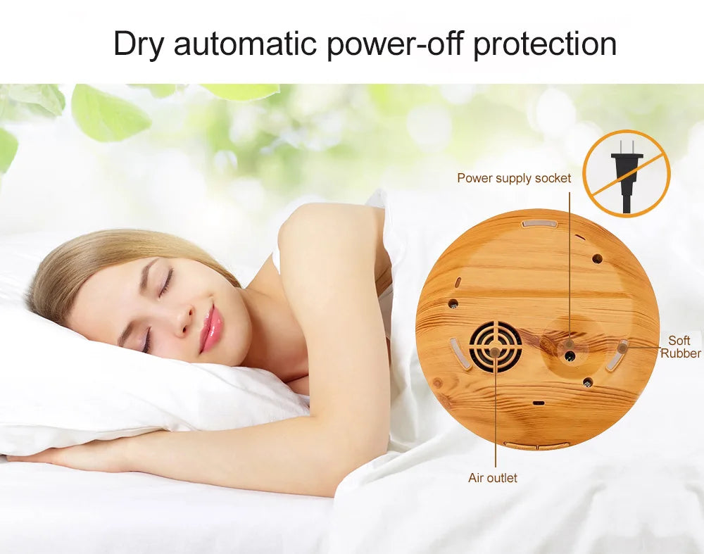 Light wood grain essential oil diffuser showing underside details including air outlet, power socket, and rubber feet.