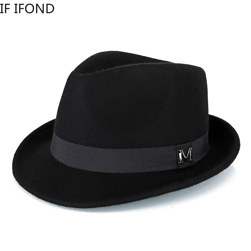 A classic black wool felt fedora hat featuring a matching grosgrain ribbon band and a decorative metal 'M' detail.