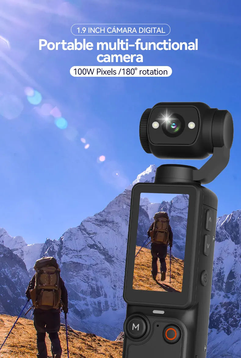 Black handheld digital camera with a 1.9-inch screen and a rotating camera lens, set against a mountain background.