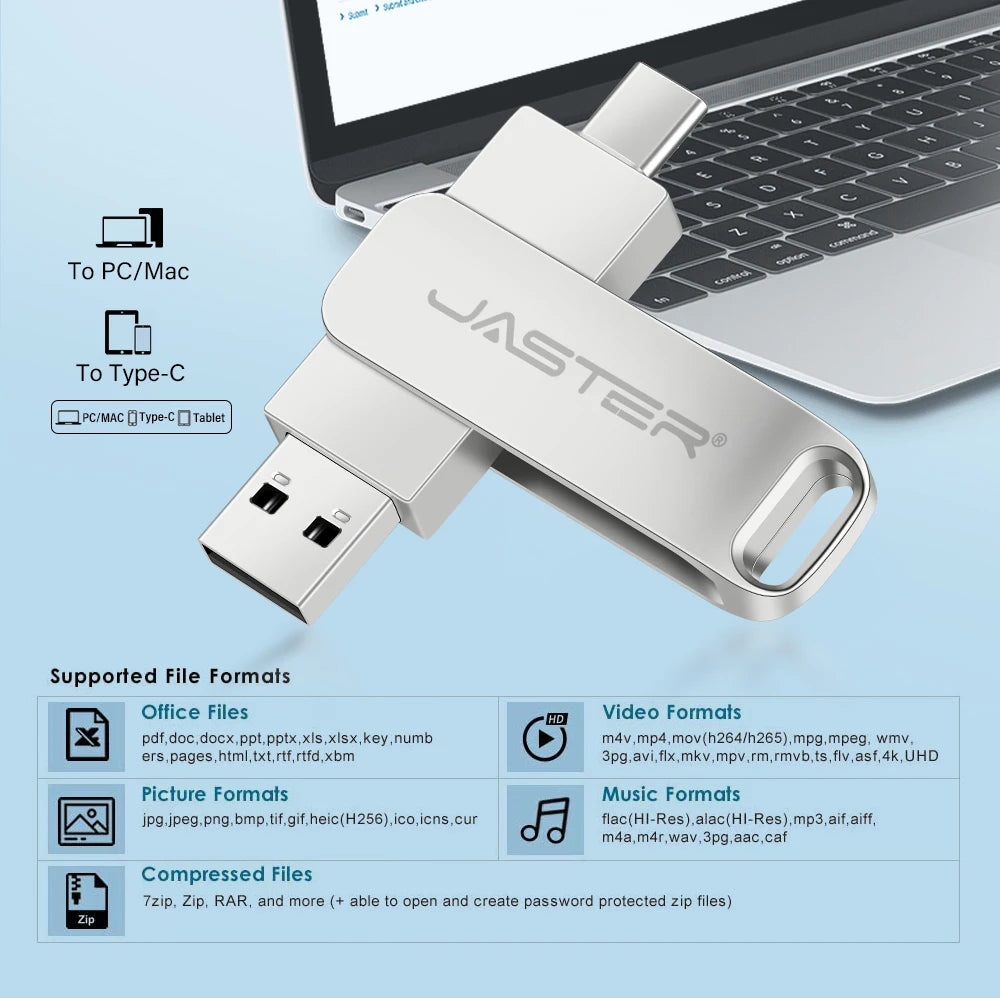Silver metal 2-in-1 flash drive with USB-C and USB 2.0 connectors, shown resting on a laptop keyboard.