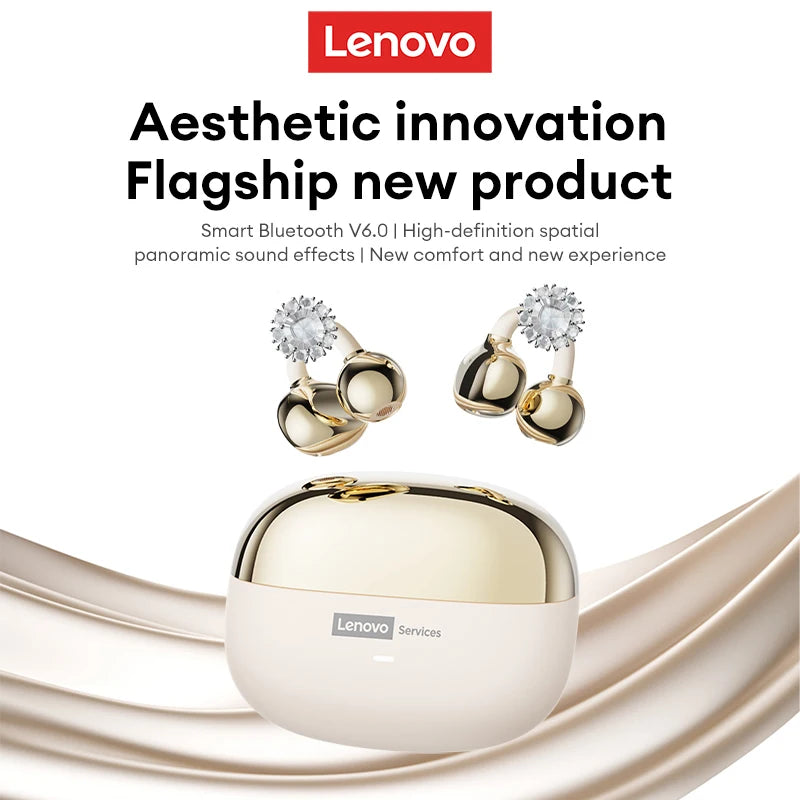 Gold and cream wireless earbuds with rhinestone accents and a matching rounded charging case on a draped background.