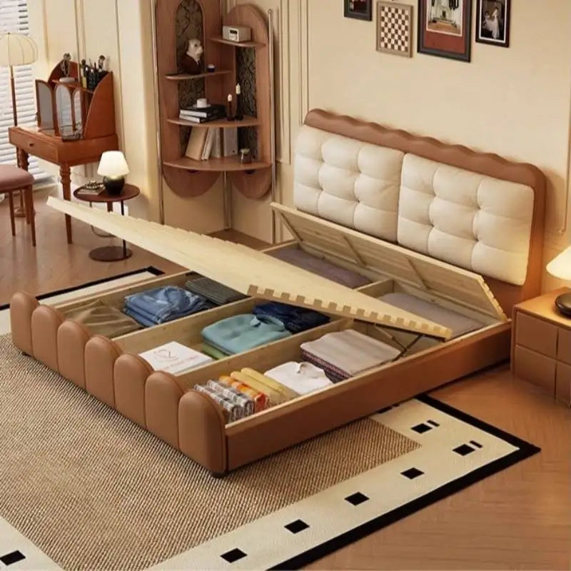 Modern tan platform bed with tufted cream headboard, featuring an open base with partitioned storage compartments.