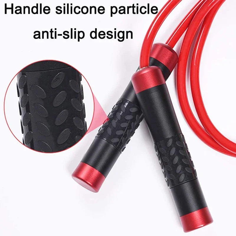 Red jump rope with black cylindrical handles featuring anti-slip silicone particle grips and red caps.