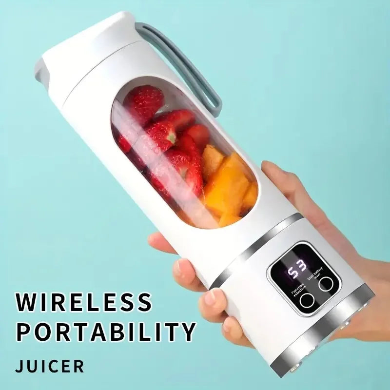 White portable wireless juicer with a clear chamber, fruit inside, and a digital LED display screen on the base.