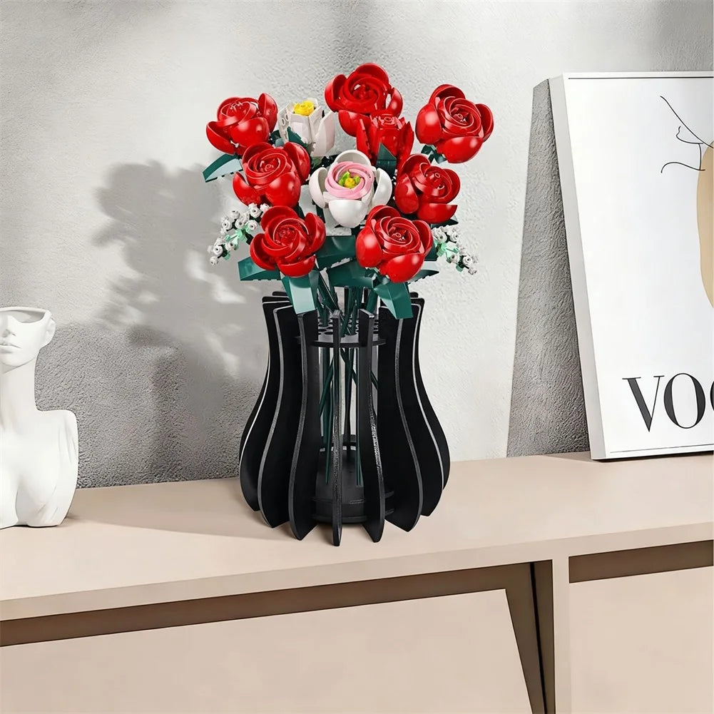 Bouquet of bright red roses built from plastic blocks, displayed in a modern, slatted black vase on a console table.