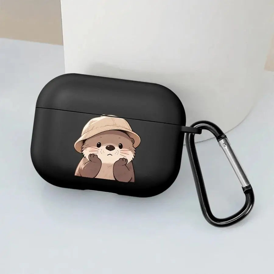 Black silicone AirPods Pro case featuring a cute otter in a bucket hat, complete with a black metal carabiner clip.