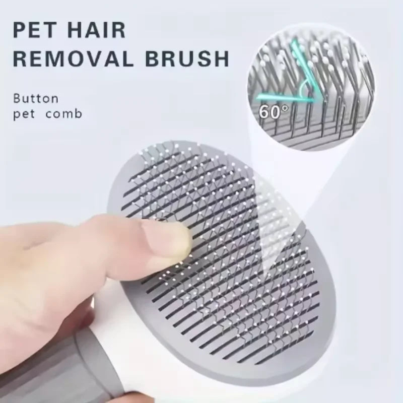 Grey and white self-cleaning pet hair brush with 60-degree angled bristles, held in a hand.