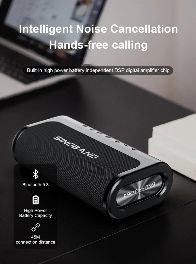 A sleek, black, portable 80W wireless Bluetooth speaker with tactile control buttons, on a desk next to a laptop.